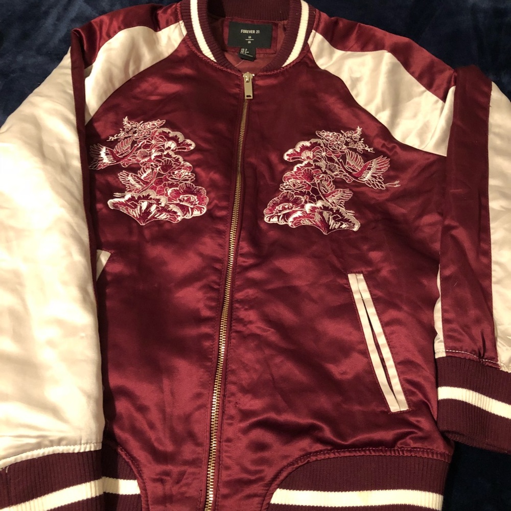 Maroon bomber jacket.